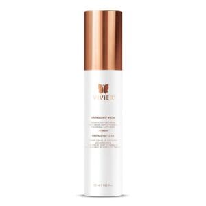 Elegant white skincare bottle with rose gold cap.