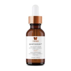 Brown glass dropper bottle labeled "Instytutum" skincare serum.