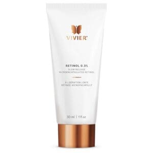 A white tube of Vivre skincare product with gold accents.